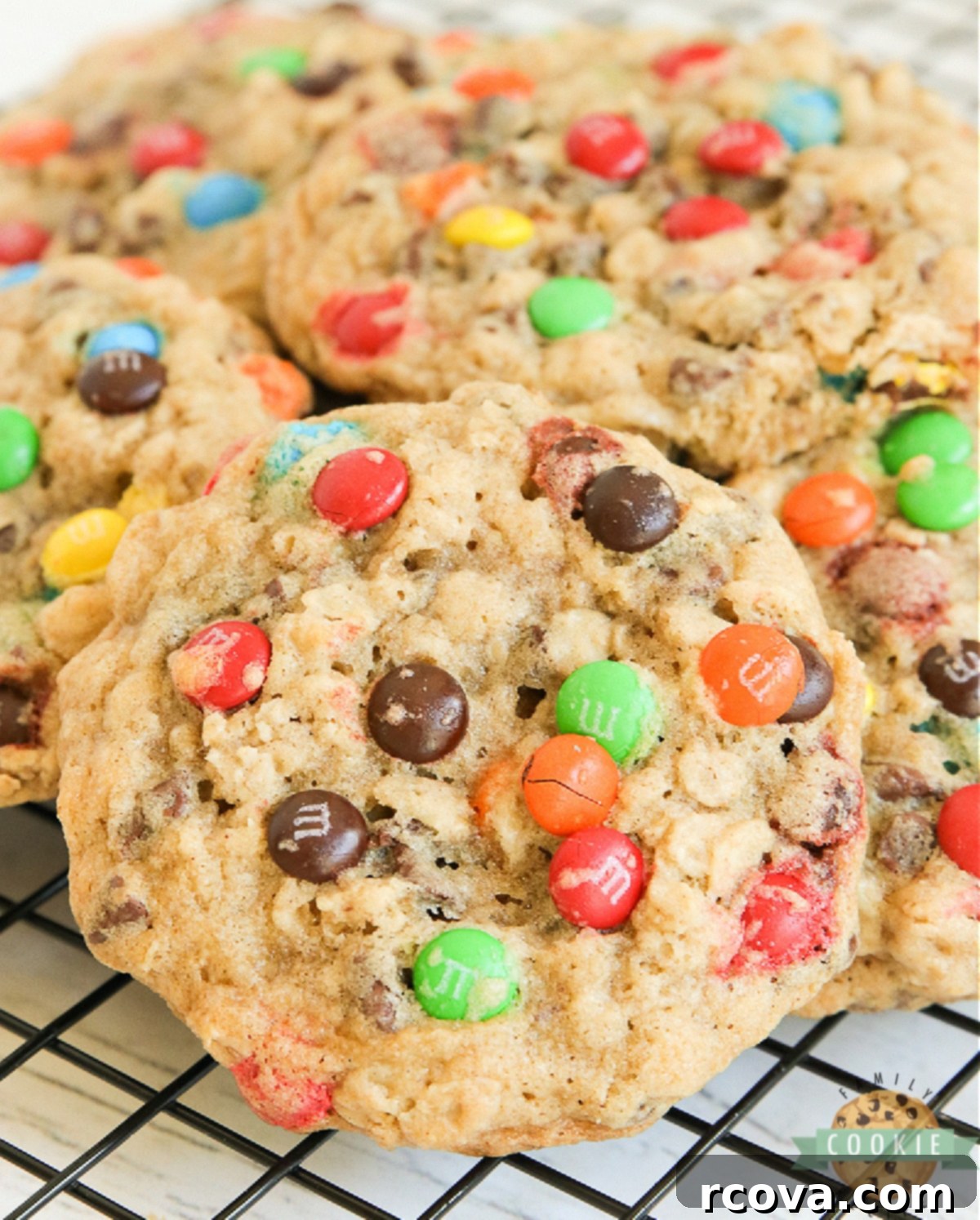 Colorful M and M Oatmeal Cookies 8 Close-up of M&M Oatmeal Cookie dough balls on a baking sheet, ready for the oven.