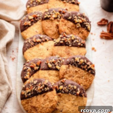 Pecan Shortbread Cookies 6 Pecan Sandies cookies with chocolate drizzle and chopped pecans