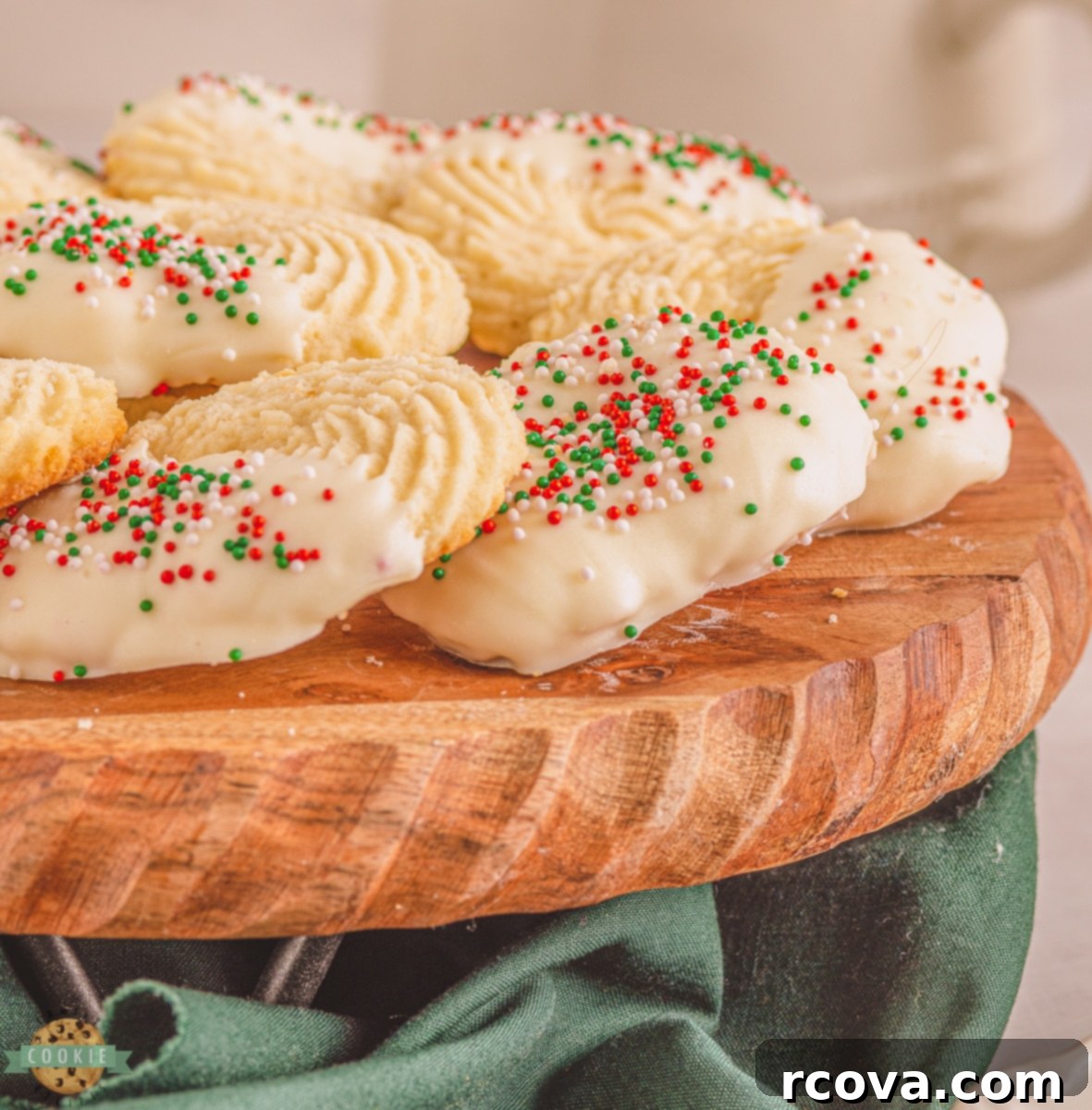 White Chocolate Buttery Delights 8 Stacked white chocolate butter cookies with sprinkles