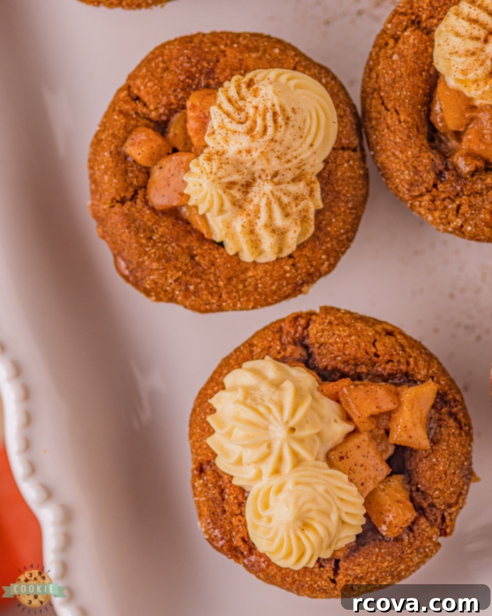 Warm Spiced Caramel Apple Gingerbread Cookies 4 Ingredients for gingerbread cookies laid out on a counter, including butter, brown sugar, molasses, flour, and various spices.