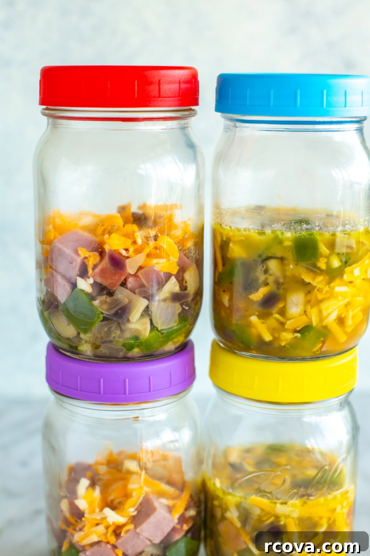 Microwave Omelette Meal Prep 9 Close-up view of a microwave omelette in a mason jar, highlighting the delicious cooked eggs, cheese, and vegetables.