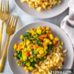 Garden-Fresh Tofu Scramble 10 A plate of tofu scramble with a side of hashbrowns.