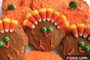 Pillowy Soft Sugar Cookies 9 Thanksgiving decorated sugar cookies with chocolate frosting, candy corn, and M&M's