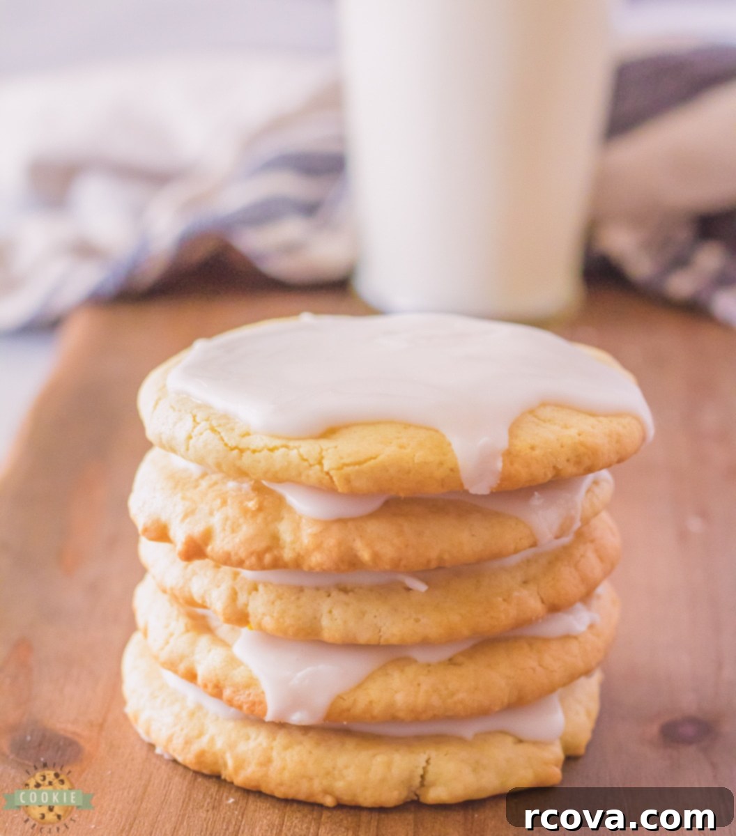 Golden Crispy Sugar Cookies 7 Stack of crispy sugar cookies neatly stored in an airtight container to maintain freshness.