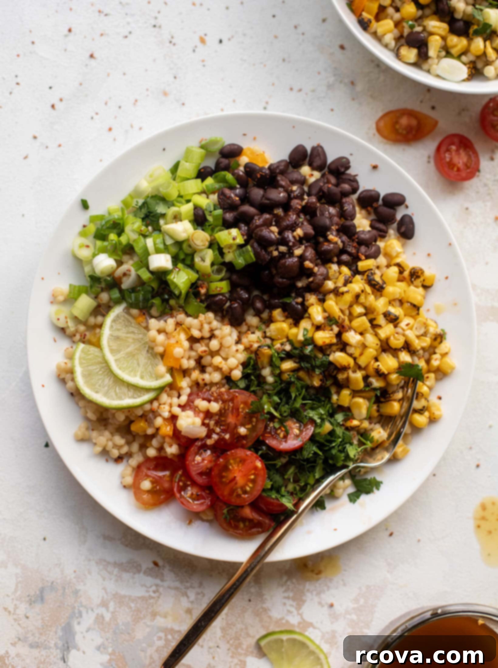 Over 20 Healthy Grain Bowl Recipes for Stress-Free Meal Prep 26 Lunchtime Southwest Couscous Bowls via How Sweet Eats, served with chili lime dressing.