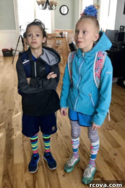 Your Favorite Chick Fil A Cookies At Home 11 A young child with crazy hair and socks, holding a cookie