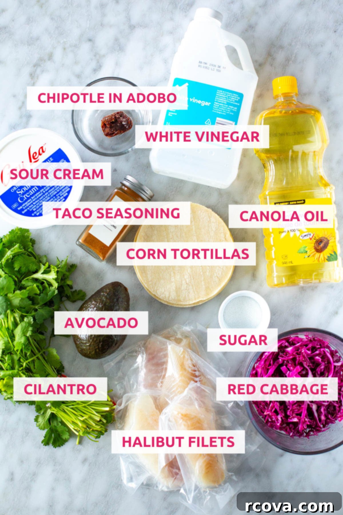 No-Fuss Fish Tacos 4 Ingredients for fish tacos: halibut filets, cilantro, avocado, red cabbage, sugar, canola oil, corn tortillas, taco seasoning, sour cream, chipotles in adobo and white vinegar.