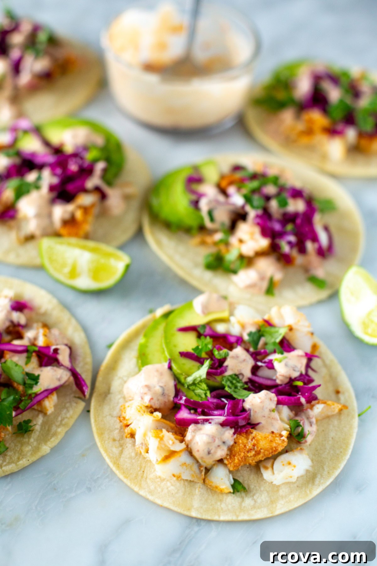 No-Fuss Fish Tacos 9 Fish tacos with coleslaw, avocado and chipotle crema.