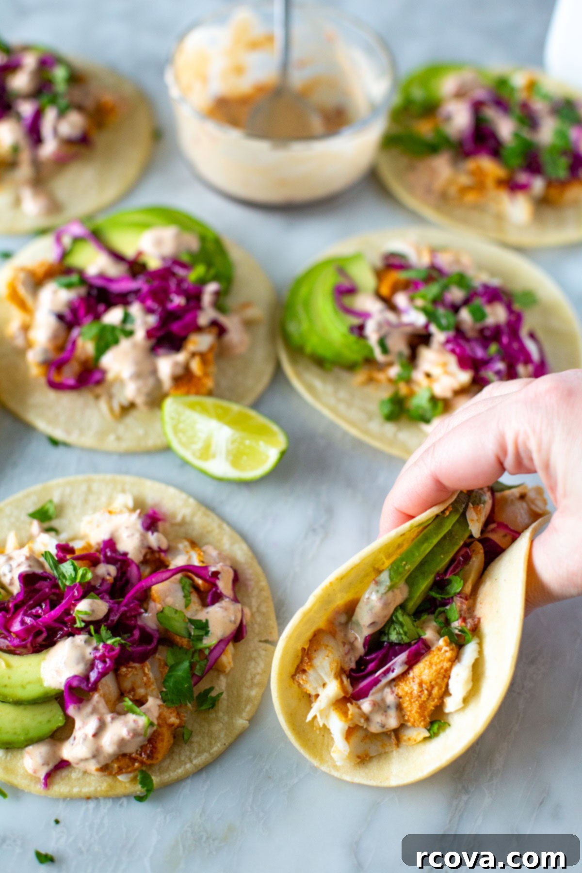 No-Fuss Fish Tacos 10 A fish taco being picked up.