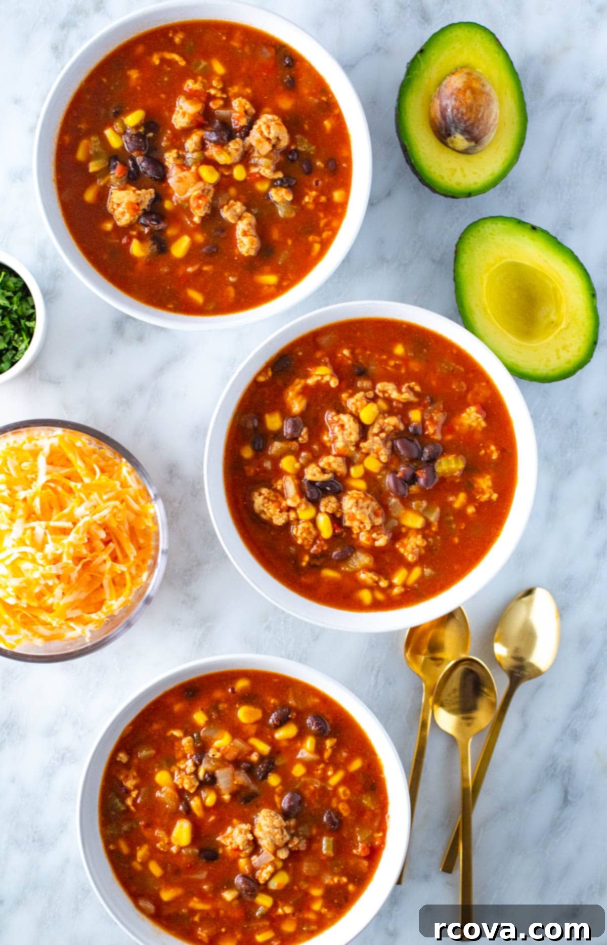 Effortless Southwest Chili 8 Southwest chili in three bowls with toppings