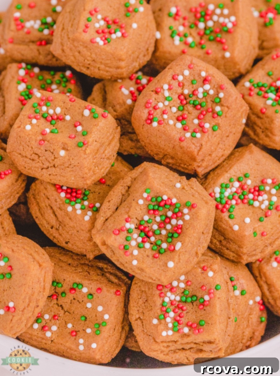 Festive Gingerbread Morsels 6 Gingerbread cookie dough pressed into a baking pan with sprinkles