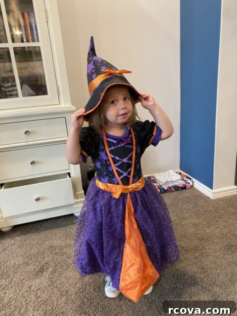 Decadent Frosted Brown Sugar Treats 12 A cute little girl dressed as a witch for Halloween, holding a small pumpkin pail, embodying the spirit of family fun and baking memories.