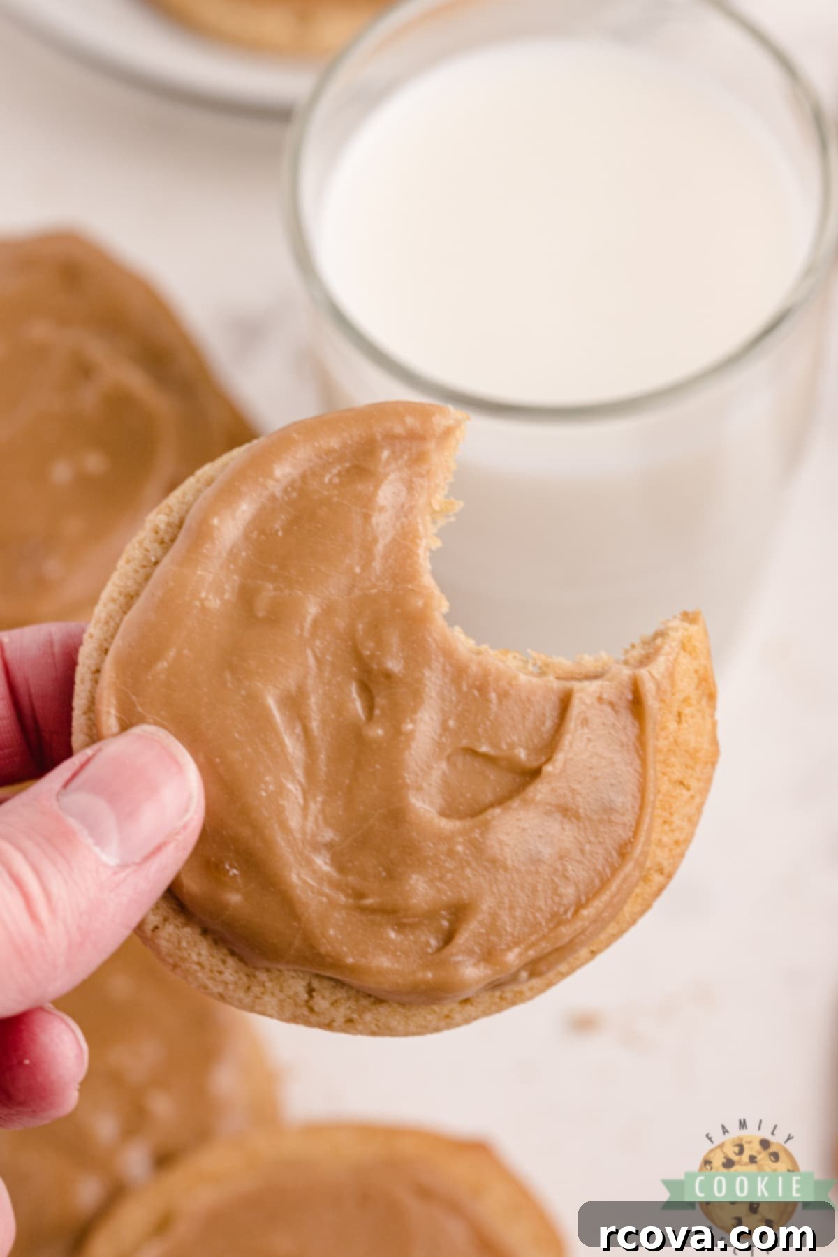 Decadent Frosted Brown Sugar Treats 9 A stack of Frosted Brown Sugar Cookies, showcasing the soft and chewy texture and simple brown sugar frosting. These are easy to make and perfect for a sweet treat.