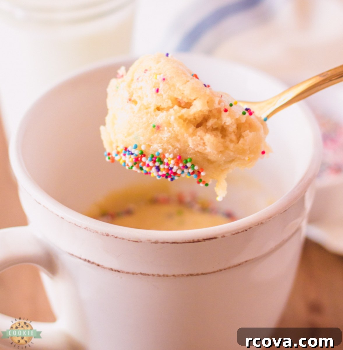 Simple Mug Sugar Cookie 3 The finished sugar cookie in a mug, topped with colorful sprinkles, ready to eat.