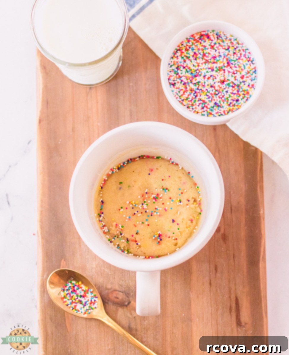 Simple Mug Sugar Cookie 6 Another perspective of the sugar cookie in a mug, garnished with colorful toppings.