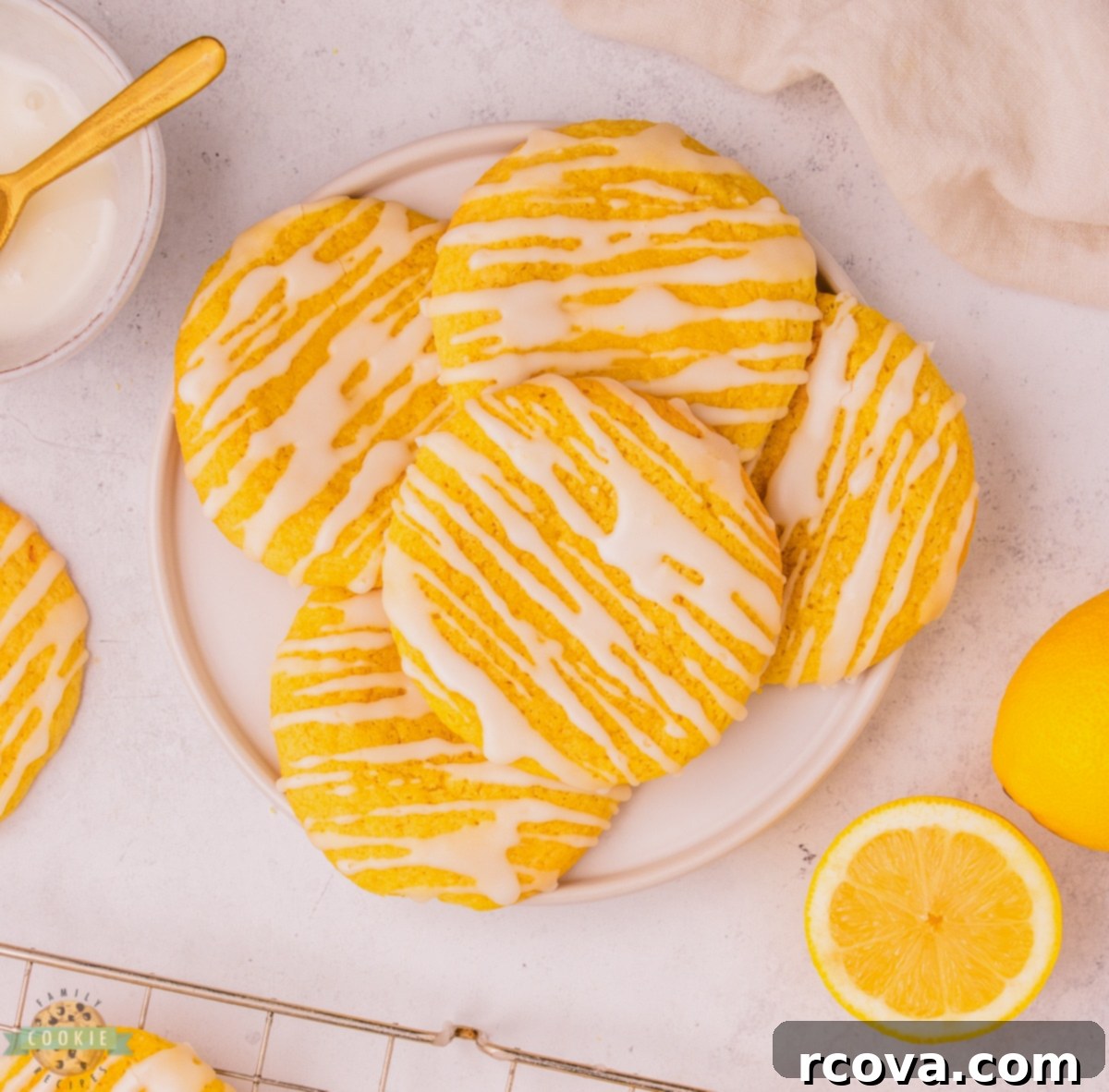 Cloud-Soft Lemon Glaze Treats 7 Baked Soft Glazed Lemon Cookies on a cooling rack
