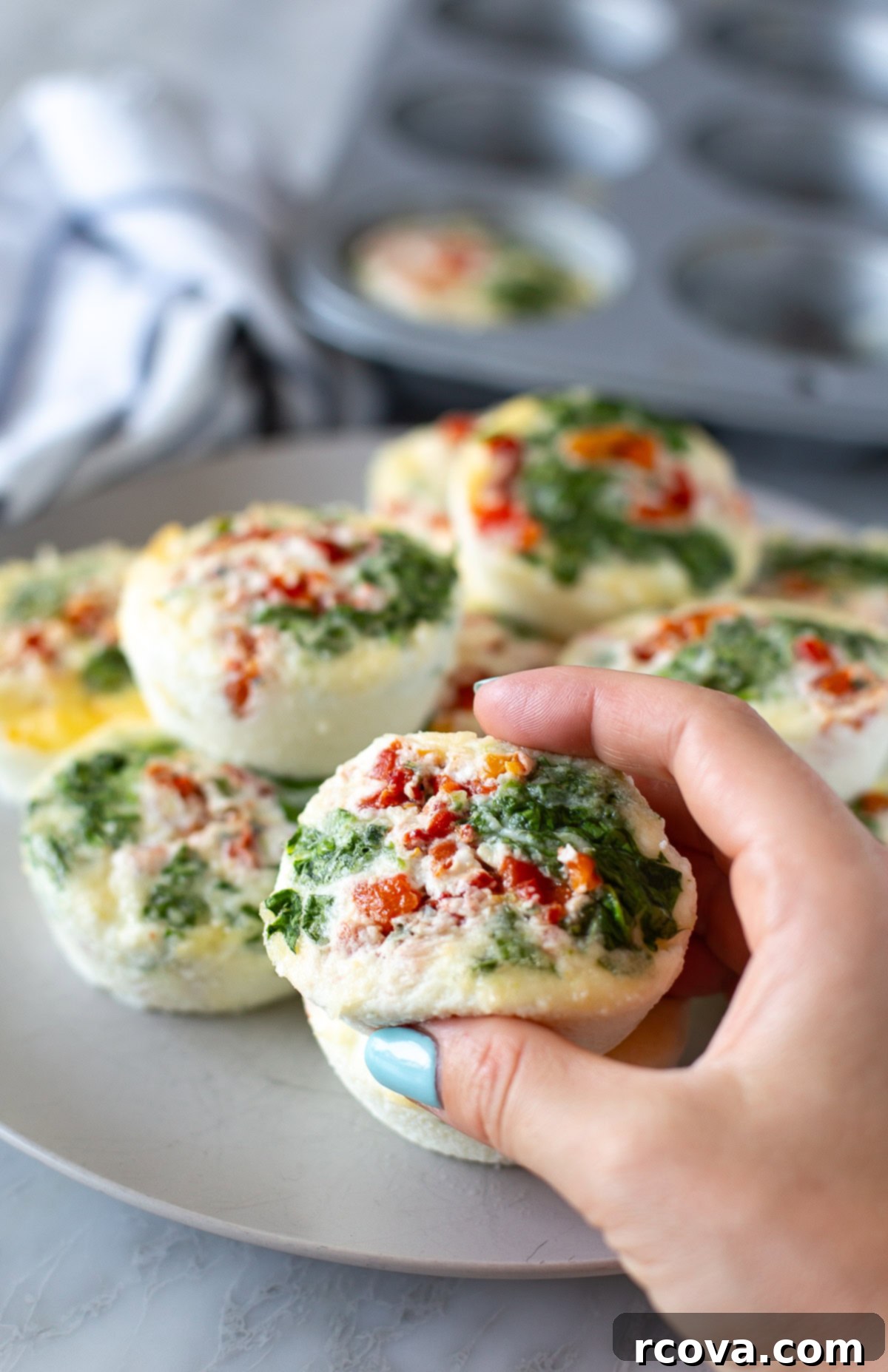 Homemade Starbucks Egg White Bites 10 Hand holding Starbucks egg white bites
