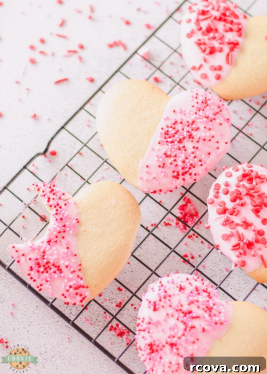 Love-Filled Heart Cookies 5 Heart-shaped cookie dough cutouts on a baking sheet