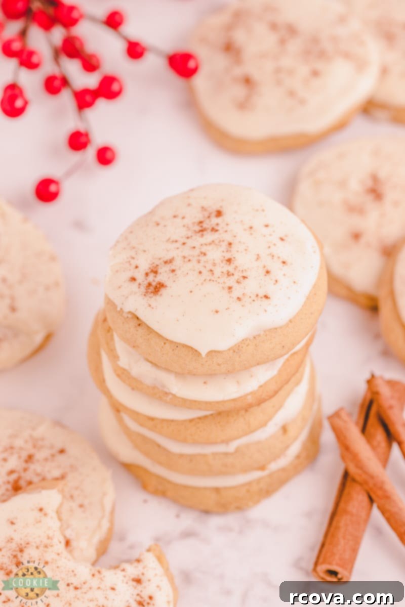 Iced Eggnog Delights 8 Stacked Frosted Eggnog Cookies on a plate