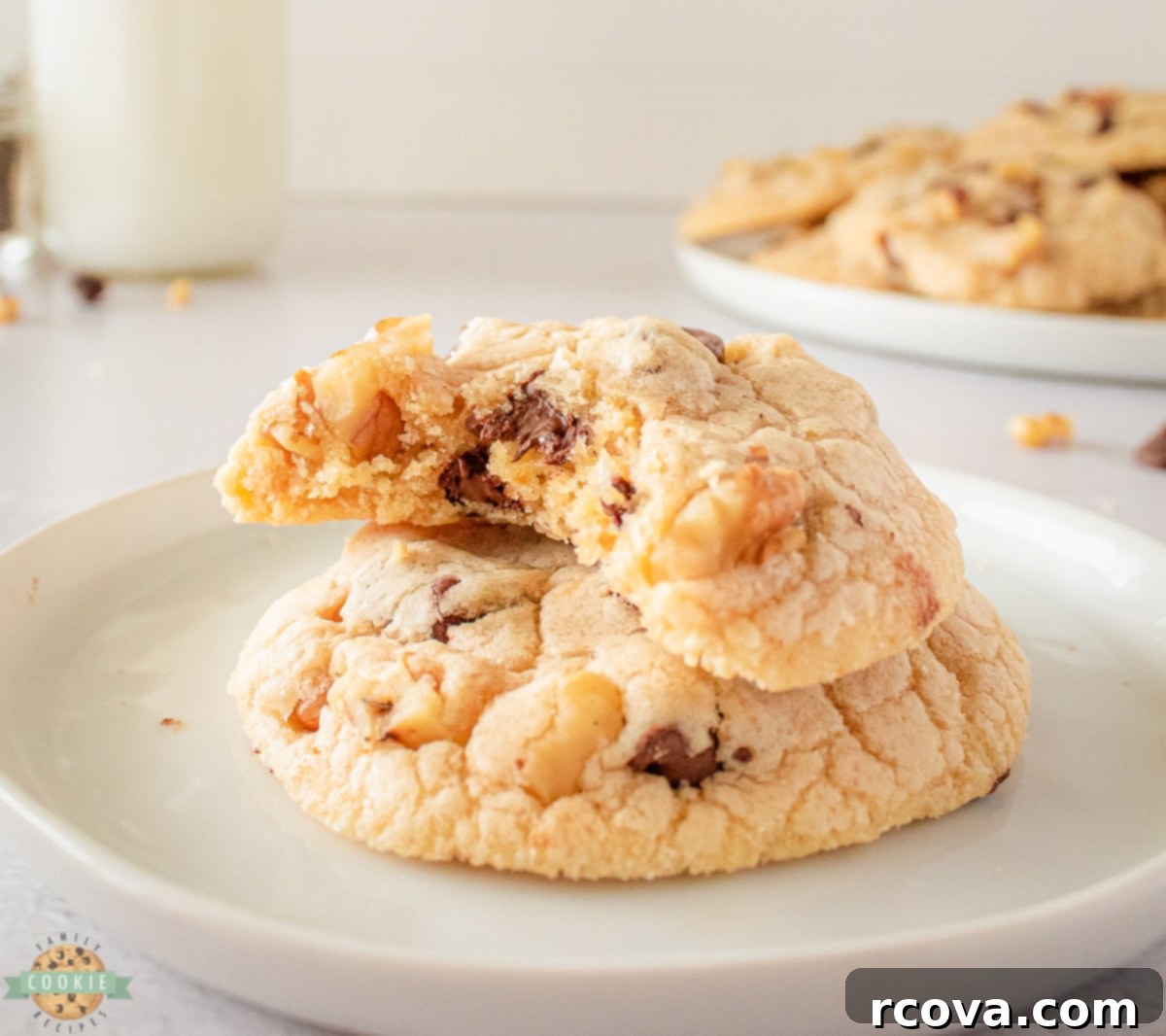 Decadent Brown Butter Walnut Chocolate Chip Cookies 8 Stacked Brown Butter Walnut Chocolate Chip Cookies on a cooling rack
