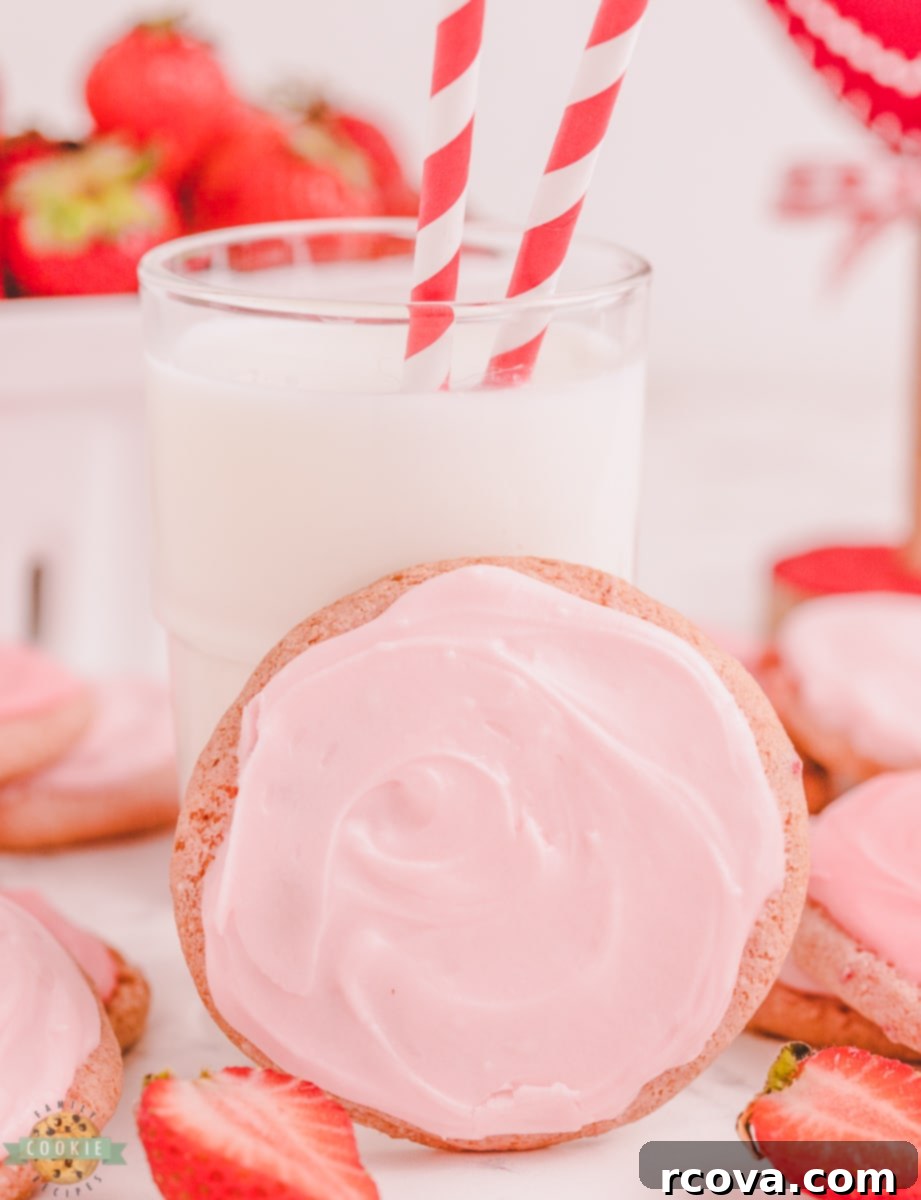 Strawberry Whipped Dream Cookies 2 Freshly baked strawberry cool whip cookies with a glass of milk, inviting and delicious