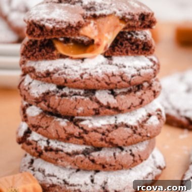 Chocolate Crinkles with a Caramel Heart 7 Close-up image of a Caramel Chocolate Crinkle Cookie with gooey caramel peeking out.
