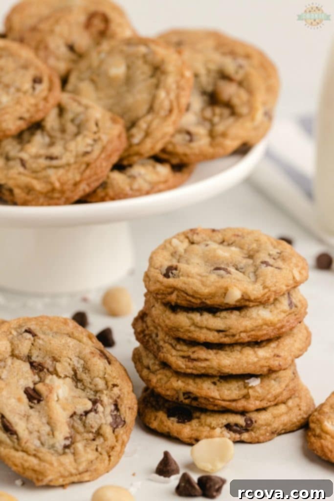 Irresistible Homemade Chocolate Chip Cookie Recipes 26 Chocolate chip macadamia nut cookies with coconut flakes visible.