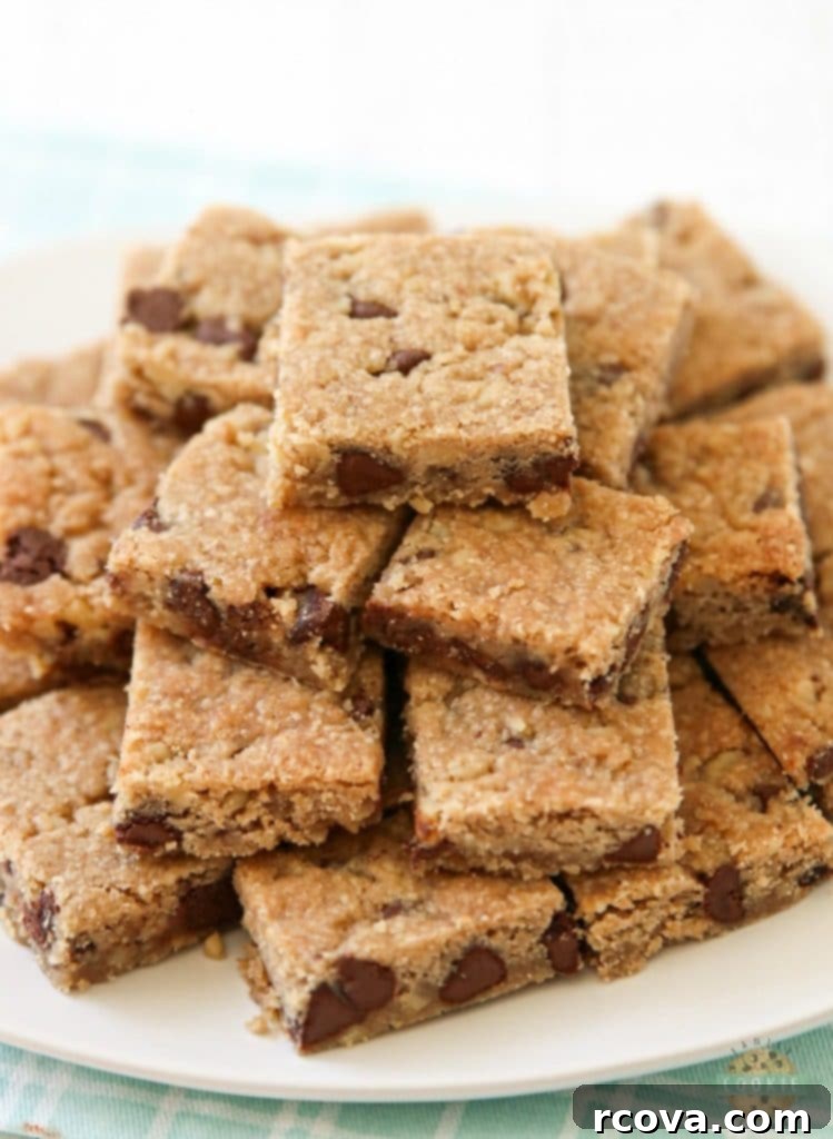 Irresistible Homemade Chocolate Chip Cookie Recipes 27 A tray of chocolate chip cookie bars, cut into squares.
