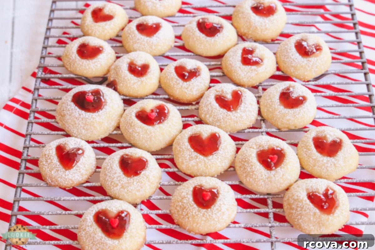 Sweetheart Thumbprint Cookies 2 thumbprint cookies with hearts for Valentine's Day