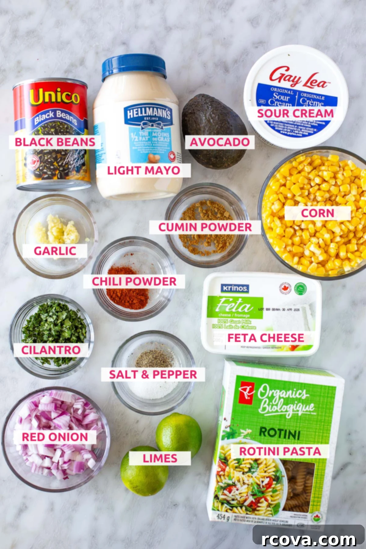 Fiesta Elote Pasta Salad 4 Overhead shot of ingredients for Mexican street corn pasta salad with labels.