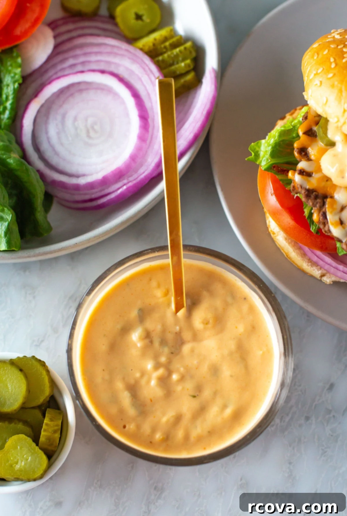 Signature Burger Sauce 7 Overhead shot of a vibrant bowl of special burger sauce, ready to be served and enjoyed with various dishes.