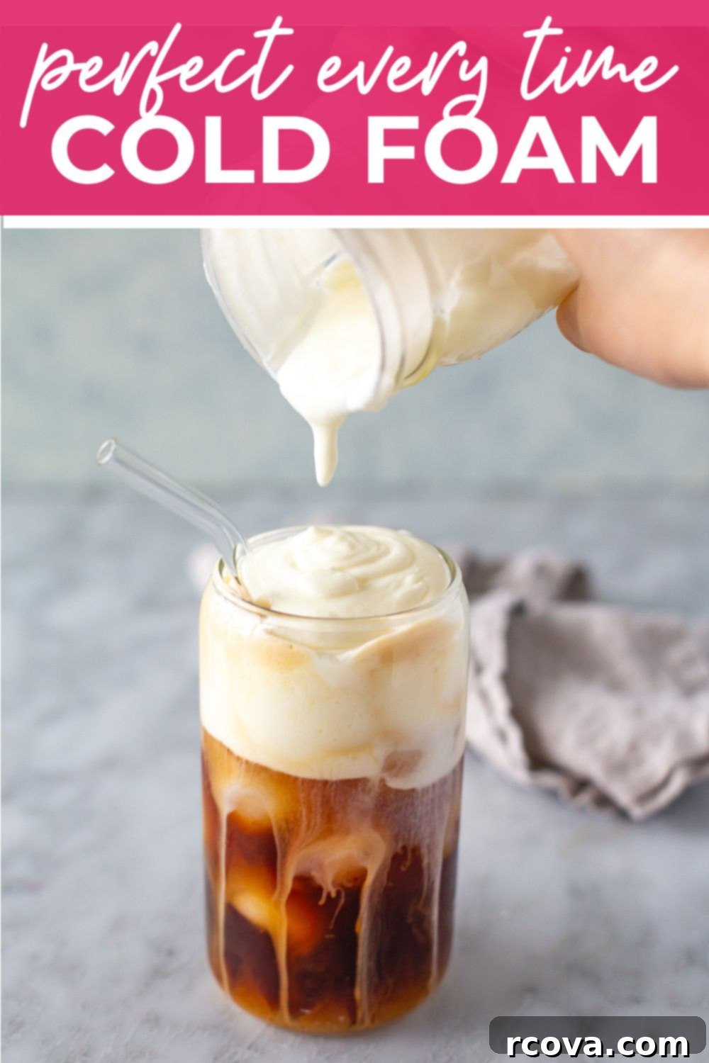 Effortless Cold Foam Perfection 10 Cold foam being poured over iced espresso, creating a beautiful layered drink.