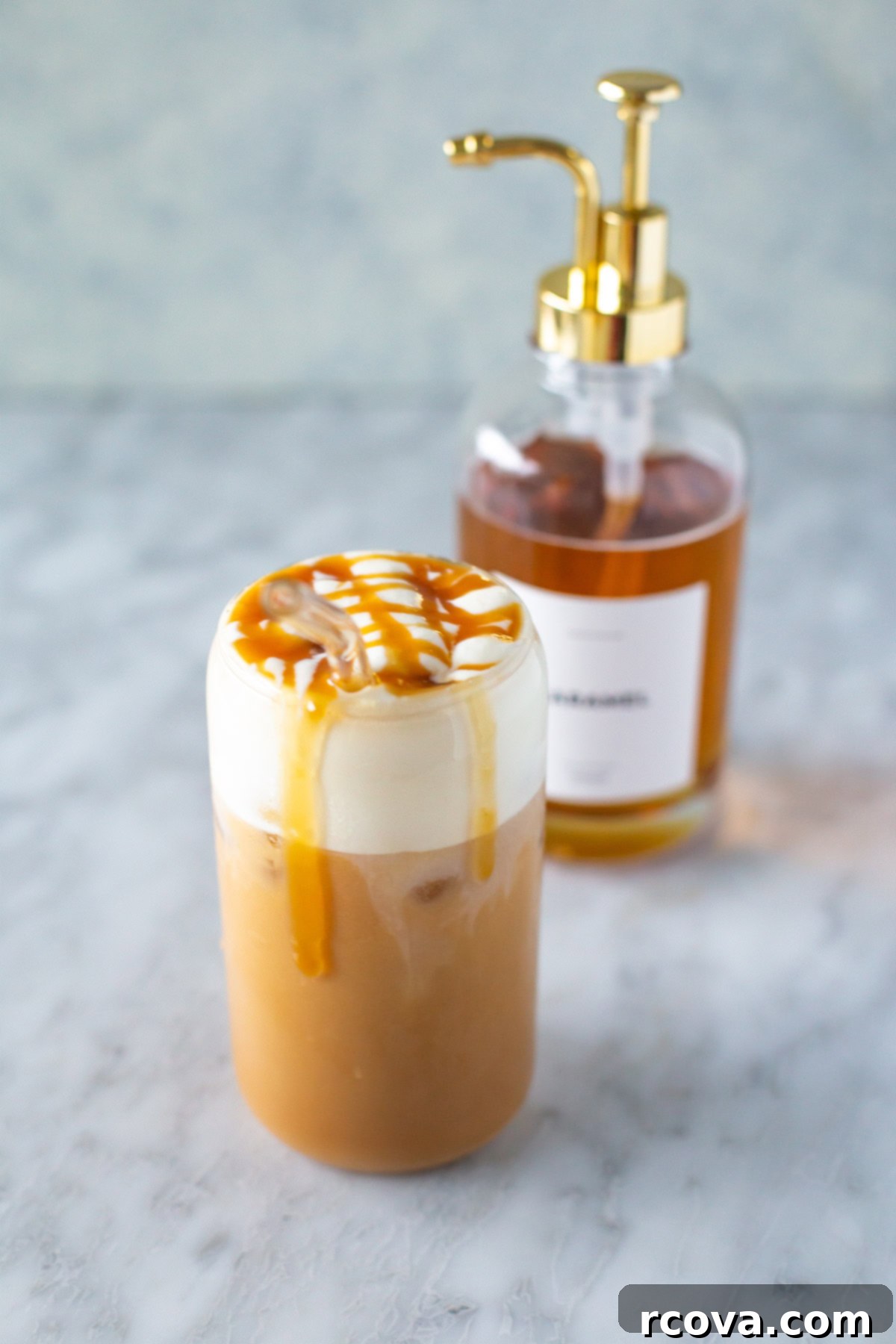 Barista Style Caramel Syrup for Iced Coffee 10 Delicious iced coffee topped with a generous drizzle of homemade caramel syrup, highlighting its smooth texture and appetizing color.