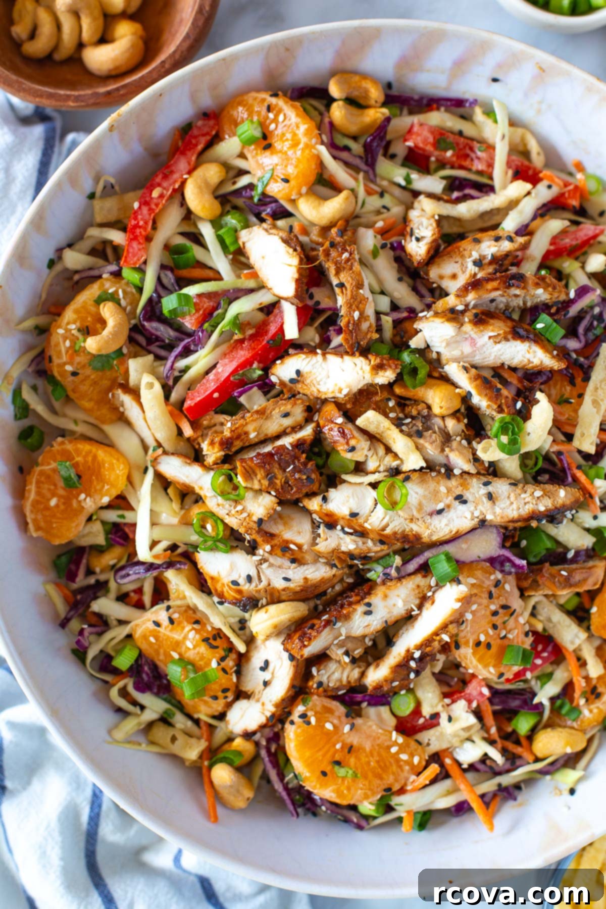 Vibrant Mandarin Chicken Salad 9 A close-up of Mandarin Chicken Salad in a bowl, showing the texture and dressing.