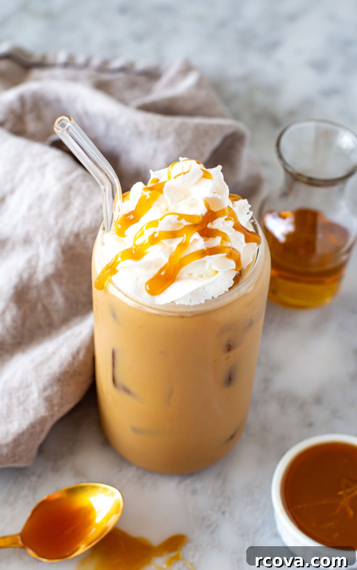 Effortless Iced Caramel Latte Dream 8 A close-up shot of an Iced Caramel Latte, highlighting its rich layers and creamy texture.