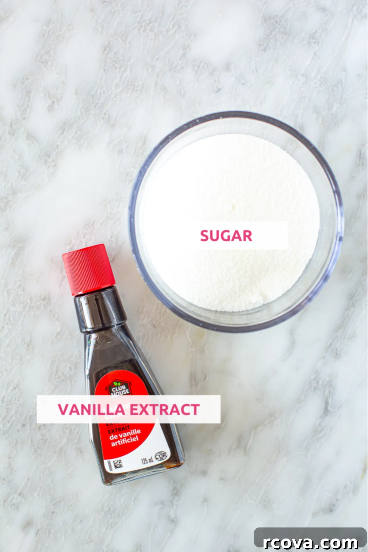Easy Homemade Vanilla Syrup for Iced Coffee 4 Close-up of the three simple ingredients: white sugar, water, and a bottle of pure vanilla extract, ready for making the syrup.