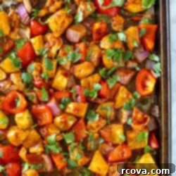 One-Pan Hawaiian Chicken 10 overhead shot of hawaiian chicken in a sheet pan 4