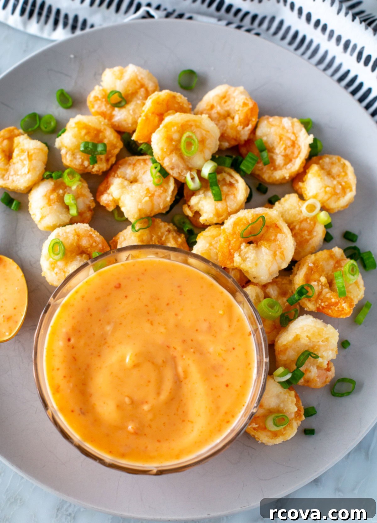 Bonefish Grill Style Bang Bang Sauce 2 overhead shot cooked shrimp with bang-bang sauce 1