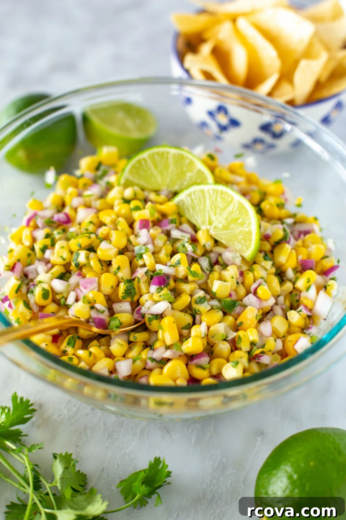 Easy Restaurant-Style Chipotle Corn Salsa 2 Overhead shot of freshly made Chipotle-style corn salsa in a bowl, garnished with cilantro, ready to be served.
