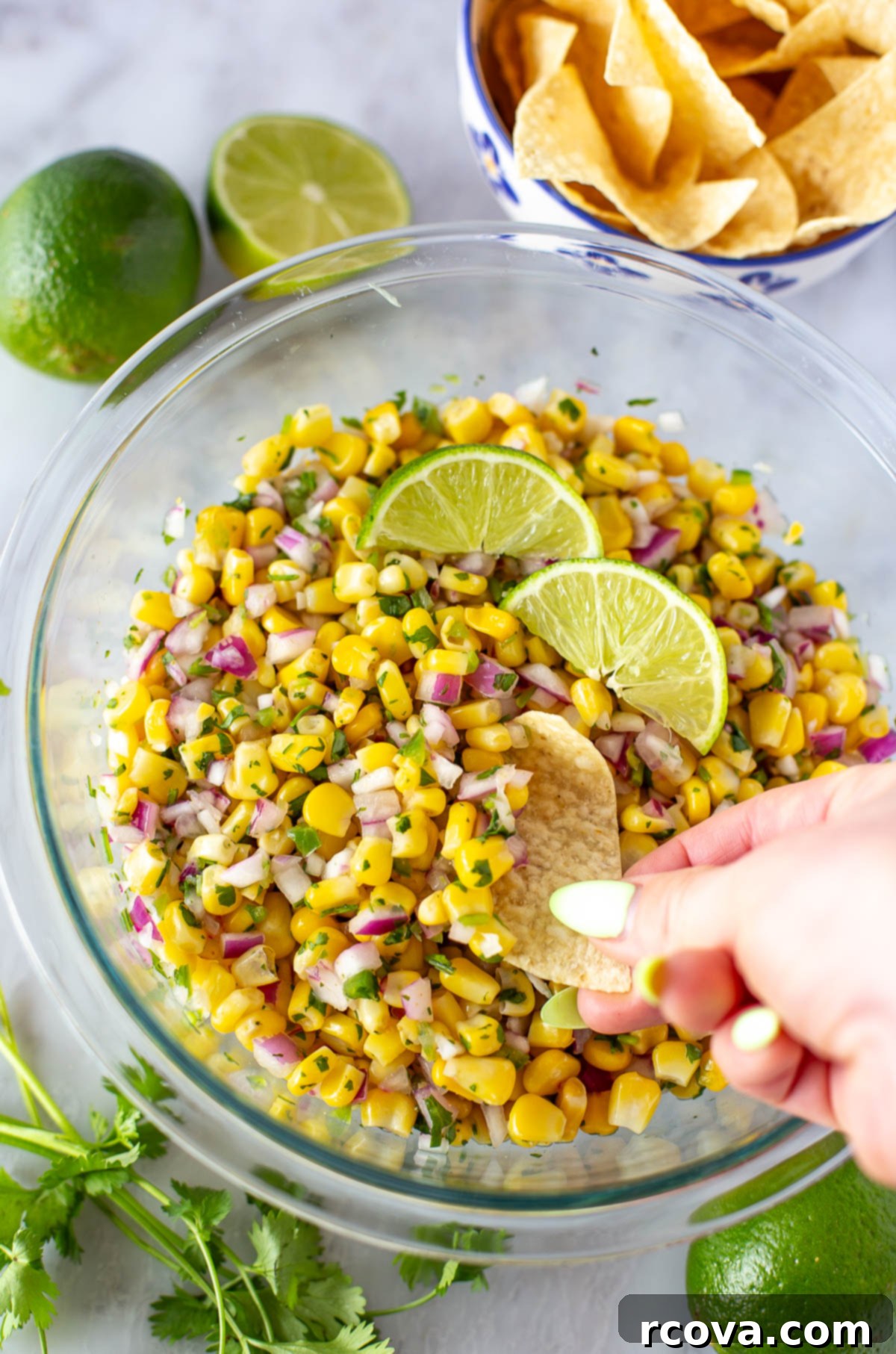 Easy Restaurant-Style Chipotle Corn Salsa 6 Close-up overhead shot of the finished Chipotle-style corn salsa, glistening and ready to be served.