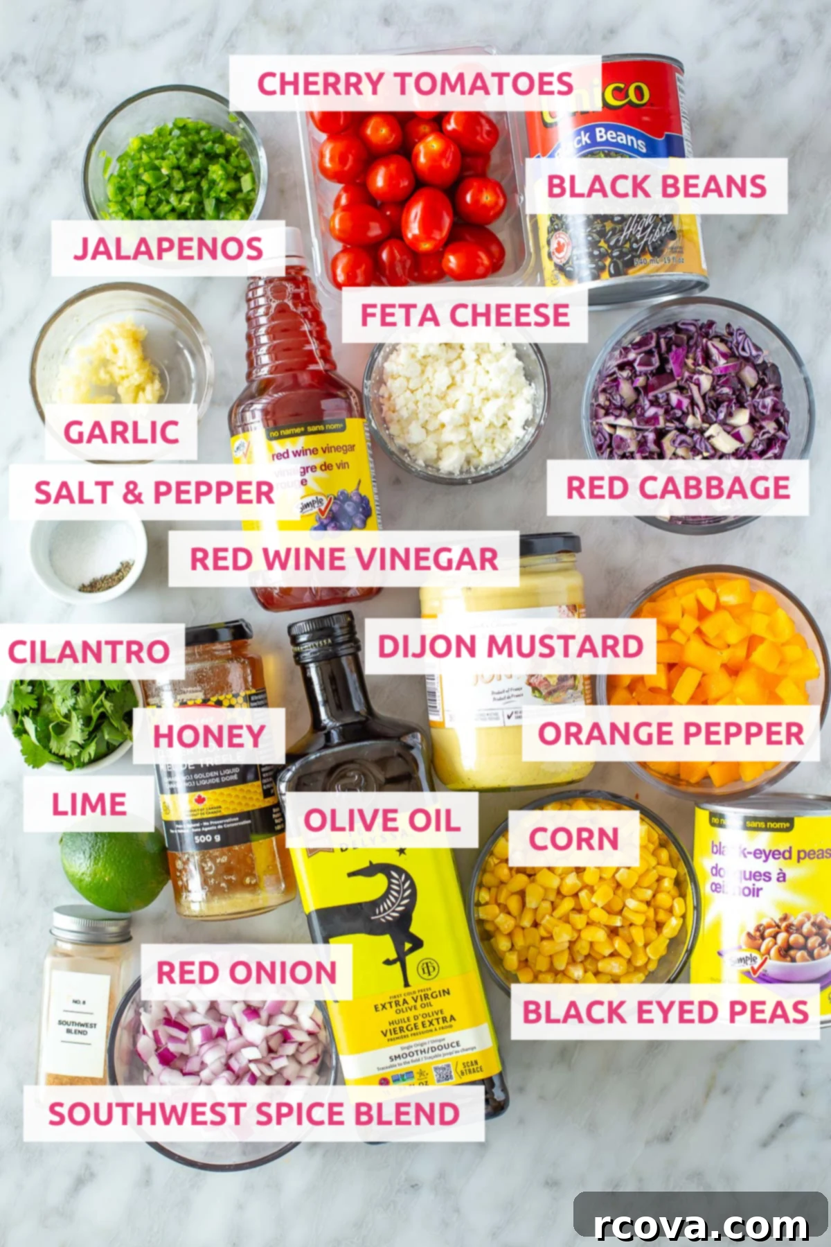 Southwest Fiesta Bean Salad 4 Organized ingredients for Southwest Dense Bean Salad, including beans, corn, fresh vegetables, and dressing components.