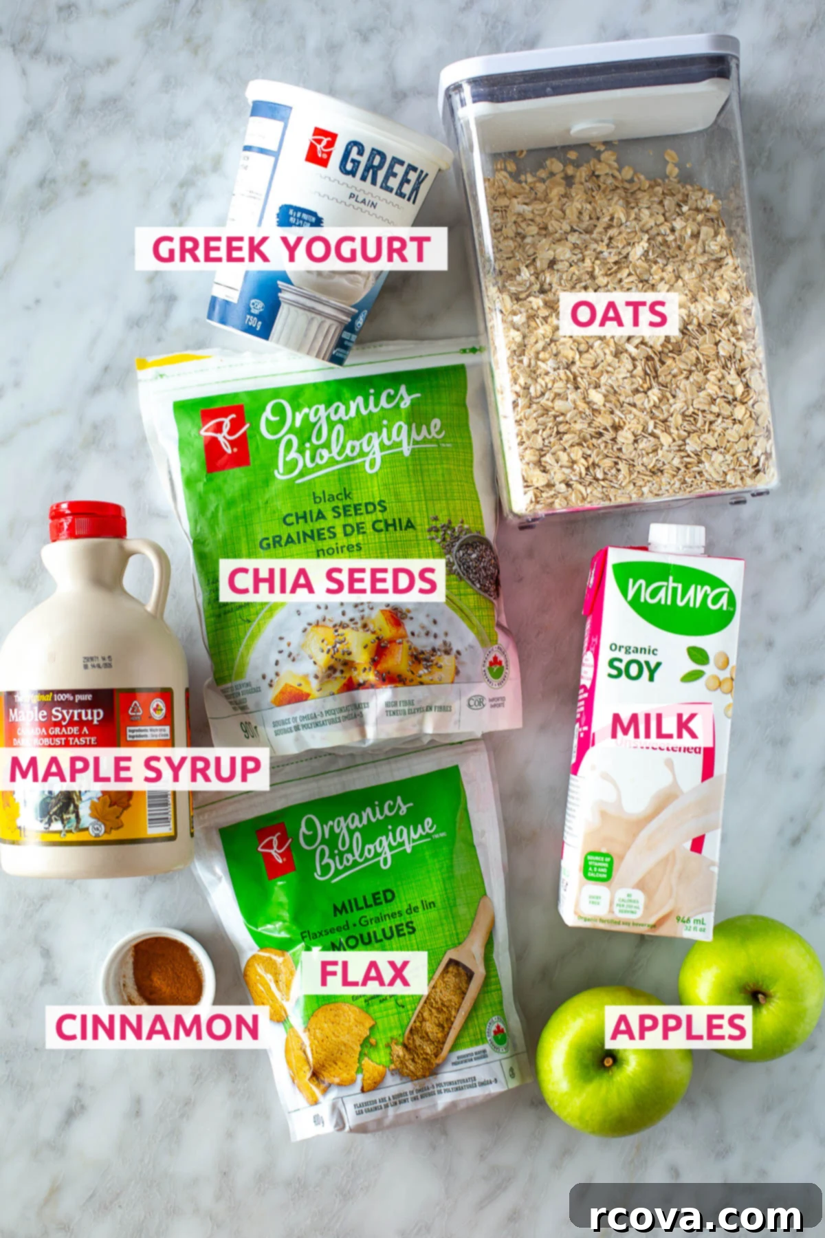 Cozy Apple Cinnamon Overnight Oats 4 An overhead shot showcasing all the essential ingredients for making Apple Cinnamon Overnight Oats, neatly laid out with labels on a wooden surface.