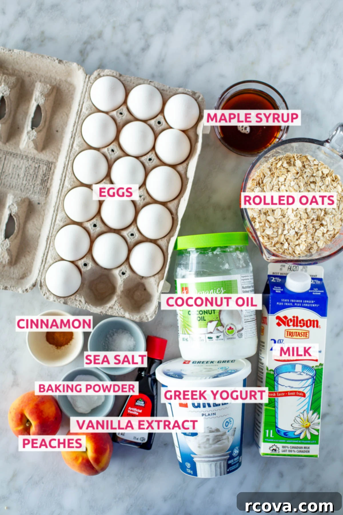 Protein-Packed Peachy Baked Oats 4 Overhead shot of all the ingredients for the High Protein Peach Baked Oatmeal recipe with labels, neatly arranged on a counter.