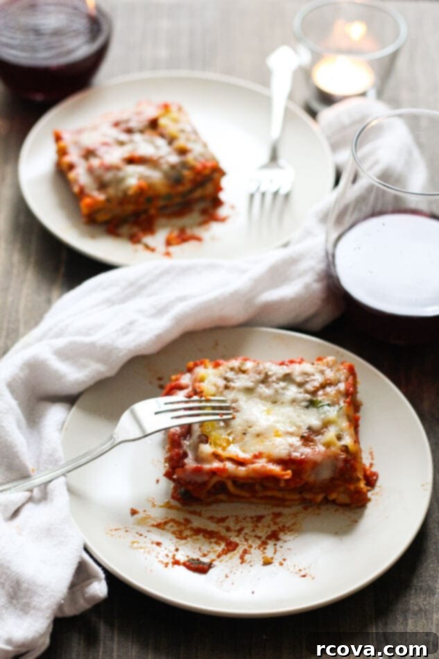 The Ultimate Online Lasagna 8 A tempting slice of homemade lasagna with three rich sauces, perfect for dinner.