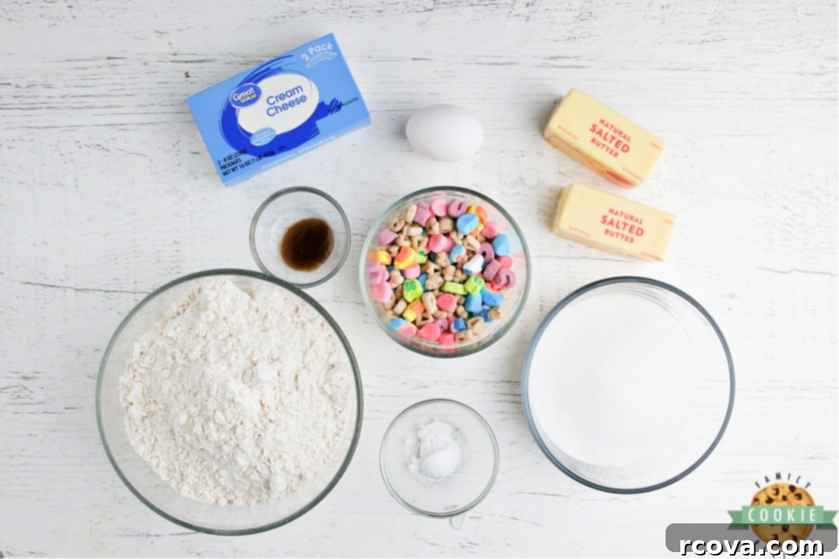 Lucky Charms Marshmallow Cookie Magic 4 Ingredients for Lucky Charms Sugar Cookies, including butter, sugar, cream cheese, egg, extracts, flour, and baking powder