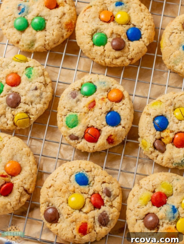 Chewy Peanut Butter Oatmeal M&M Bliss 7 M&M cookies on a cooling rack