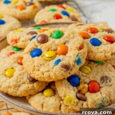 Chewy Peanut Butter Oatmeal M&M Bliss 9 peanut butter oatmeal cookies on a plate