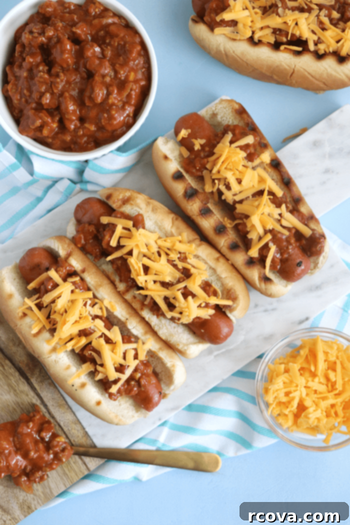 Classic Chili Cheese Dogs 3 Close-up of a loaded chili cheese hot dog with melted cheese