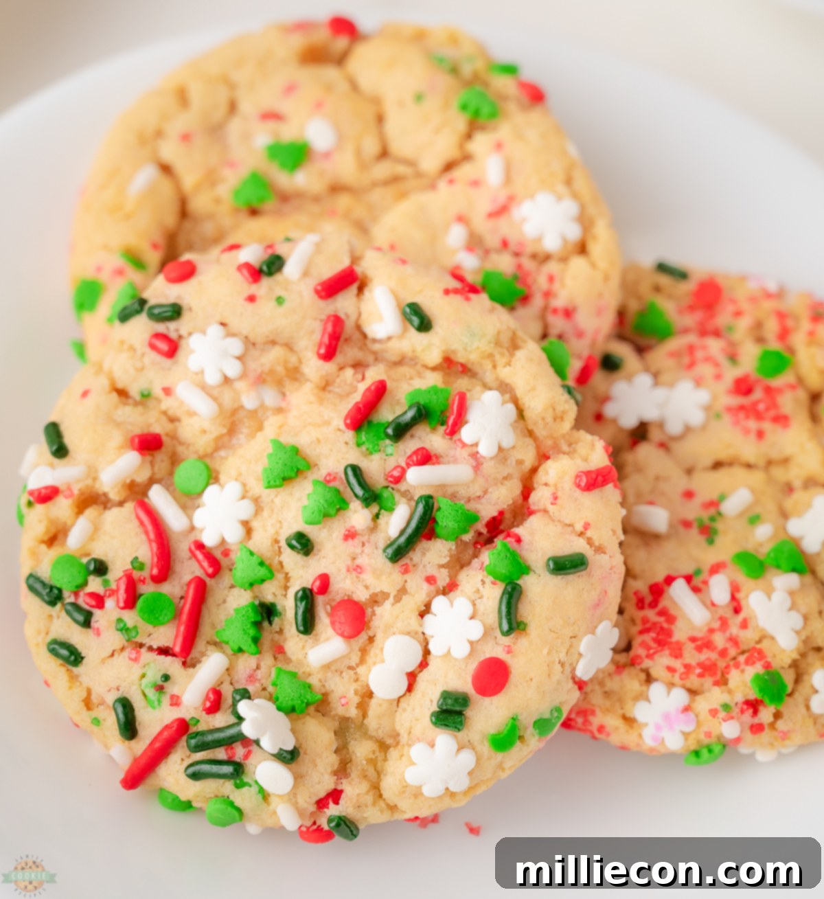 Christmas Sprinkle cookies on a white plate
