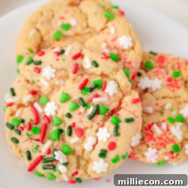 Christmas Sprinkle cookies on a white plate